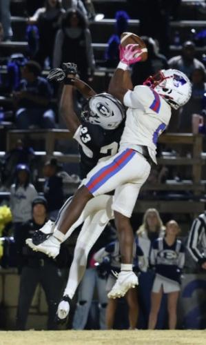 (TY JOHNSTON/THE OGLETHORPE ECHO) Paris Crowder jumps to catch a 67-yard touchdown pass in the 24-7 loss to Elbert County on Friday. The Patriots were held to 120 yards of offense.