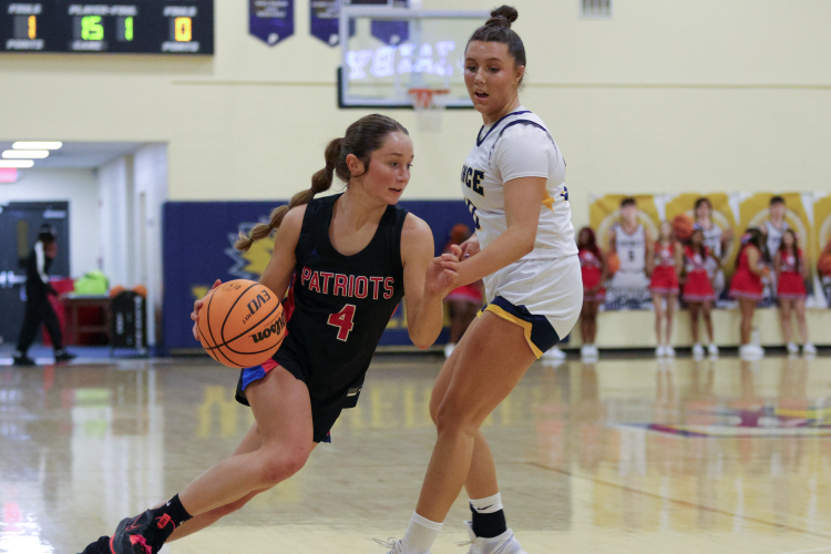 Elin Turner drives around a Prince Avenue Christian defender during a previous season. She is one of five seniors who return for the OCHS girls basketball team this year. (Staff/File)