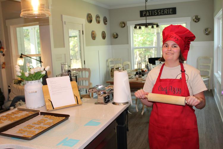 Three Dogs and a Girl Bakery opened in September, and both Izzy and Tania Marler share the goal of opening a brick and mortar location. Since opening, the bakery has offered Izzy the opportunity to learn and grow as a bakery business CEO. (Emily Adams/The Oglethorpe Echo)