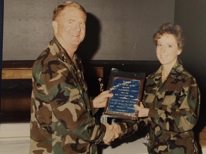 Kristen Hardigree receives an award from Colonel Silas R. Johnson Jr. for being the fastest female competitor on the obstacle course in 1992. Hardigree served two terms in the Air Force, from 1990-1997. (SUBMITTED PHOTO))