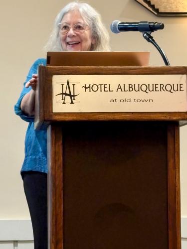 Kathleen deMarrais makes her award acceptance speech at the American Educational Studies Association 2025 conference in Albuquerque, New Mexico on Oct. 29, 2025. DeMarrais was president of AESA in 2005. (Submitted photo)