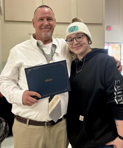 Dwaine Fowler and his daughter Deanna Lee Brooks Fowler share a moment together after he graduated from drug court on Dec. 11. Fowler spent 20 months in the program. (Photo/Submitted)