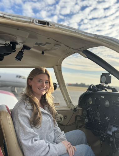 Lizzie Wadsworth sits in the cockpit of a 1967 Piper Cherokee at Athens-Ben Epps Airport last week. The Oglethorpe County High School grad, who is a junior at UGA and vice president of the UGA Aviation Club, hopes to become a commercial airline pilot. (Photo/Mia Fishman)