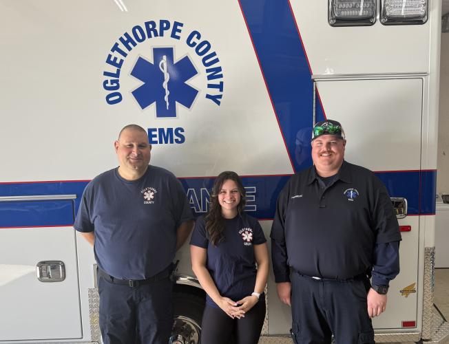 Oglethorpe County EMS supervisor paramedic Dennis Weaver (from left), paramedic Taylor Smith and advanced emergency medical tech Kelly Huff delivered a baby on Jan. 8. Weaver assisted in the delivery of the baby in the quick response vehicle while Smith and Huff responded in an ambulance. (Submitted Photo)