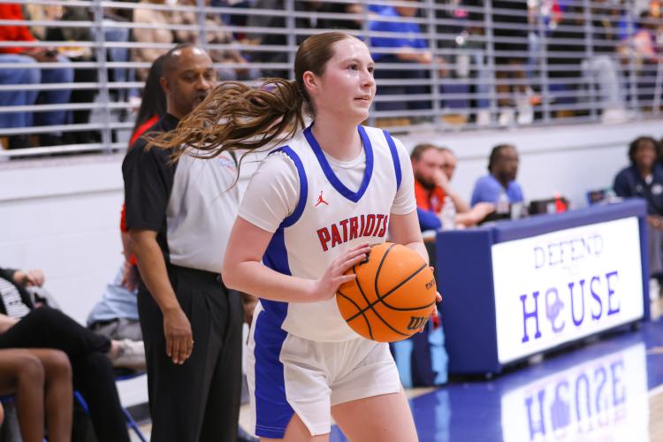 Oglethorpe County player Carlie Gabriel prepares to take a shot on Feb. 10. The Patriots lost to the Blue Devils with a score of 40-58. (Photo/Addison Simmons)