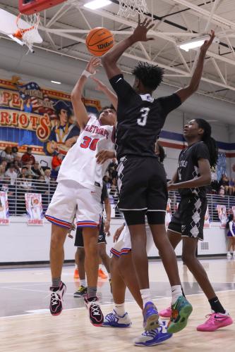 Oglethorpe County player Mason Forshee dunks on Feb. 10. The Patriots lost to the Blue Devils with a score of 54-72. (Photo/Addison Simmons)