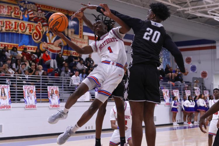 Oglethorpe County player Isaiah Ross dunks on Feb. 10. The Patriots lost to the Blue Devils with a score of 54-72. (Photo/Addison Simmons)