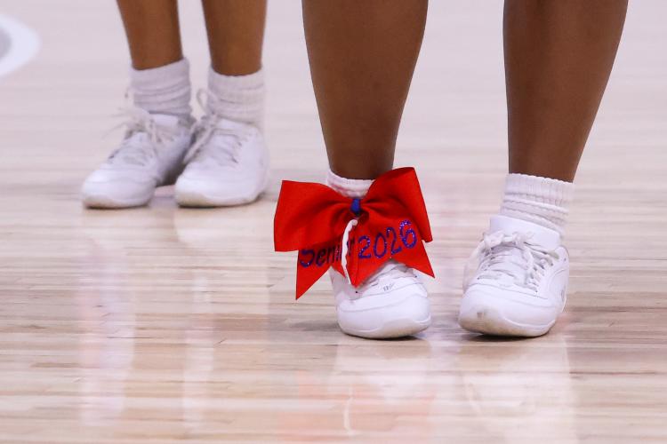 Oglethorpe County cheerleader wears a bow on her shoes on Feb. 10. The Patriots honored their senior players on Tuesday. (Photo/Addison Simmons)