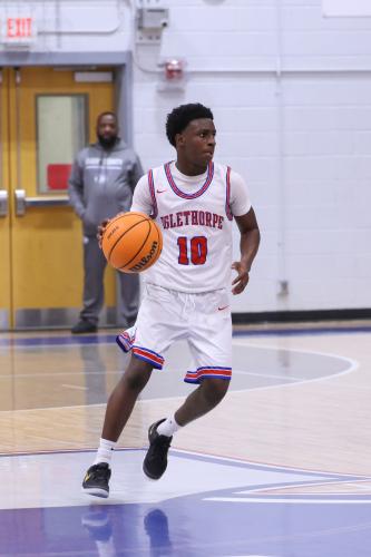 Oglethorpe County player Darius Echols dribbles down the court on Feb. 10. The Patriots lost to the Blue Devils with a score of 54-72. (Photo/Addison Simmons)