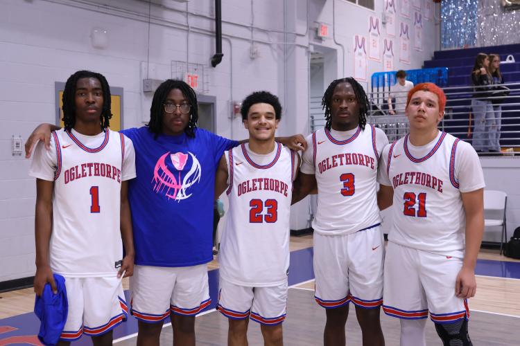 Oglethorpe County highschool seniors Isaiah Ross, Keymaury Huggs, Malik Forshee, O'Maury Huggs and Isaac Johnson pose for a photo at the Oglethorpe County High School gymnasium on Feb. 10. The Patriots honored their seniors during their game against Elbert County. (Photo/Addison Simmons)