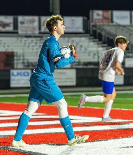 TY JOHNSTON/THE OGLETHORPE ECHO Oglethorpe County keeper Braxton Edmondson looks upfield for a teammate during a game against Madison County on Feb. 13. Edmonson also kicked and punted for the football team.