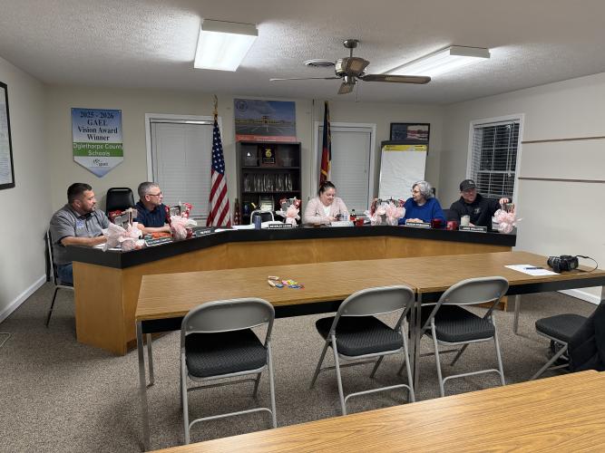 The Oglethorpe County Board of Education discuss the executive session on Tuesday, Feb. 3, 2025. They unanimously agreed on renewing contracts while tabling two others. (Photo/Jasmine Milbourne)