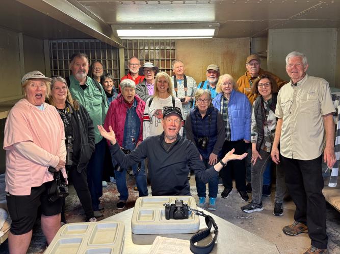 Lexington’s John Fortuna (far right) and OLLI@UGA photography students pose in one of the cells at the Historic Oglethorpe County Jail on March 9. The group also visited and photographed Beth Salem Presbyterian Church. (Submitted photo)