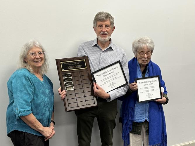 Kathleen deMarrais (from left) presents Tom Gresham and Elaine Collier Neal with Historic Oglethorpe’s annual award at the organization’s banquet on Feb. 27. Neal and Gresham, along with Ashley Simpson and Greg Yoder, were recognized for their work on the Digital Atlas of Oglethorpe County. (Submitted photo)