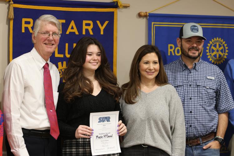 Macie McDaniel received a certificate for being named Oglethorpe County High’s STAR student at a Rotary Club meeting in February 2024. She was honored with 2024 STAR teacher Eric Schmidt (from left), Christan McDaniel and Phillip McDaniel, her mom and dad. (JIM BASS/THE OGLETHORPE ECHO)