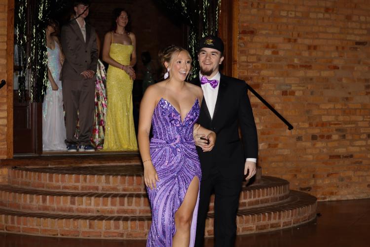 Emilee Cutsail and her date participate in the 'senior walk' during the Oglethorpe County High School prom on Saturday, April 18. (Photo/Mia Tanner)