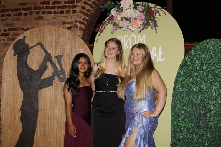 Students pose against a themed backdrop at the Oglethorpe County High School prom on Saturday, April 18. The event was held at the Historic Smithonia Farm in Colbert. (Photo/Mia Tanner)