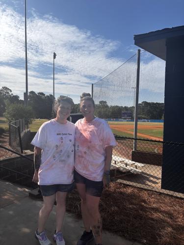 Audra Turbeville and Melissa Fortney display their colorful shirts after racing in the OCHS National Honor Society Color Fun Run on April 25. Turbeville brought her son Jackson Turbeville, who was the race winner. (CHARLOTTE COCHRAN/THE OGLETHORPE ECHO)