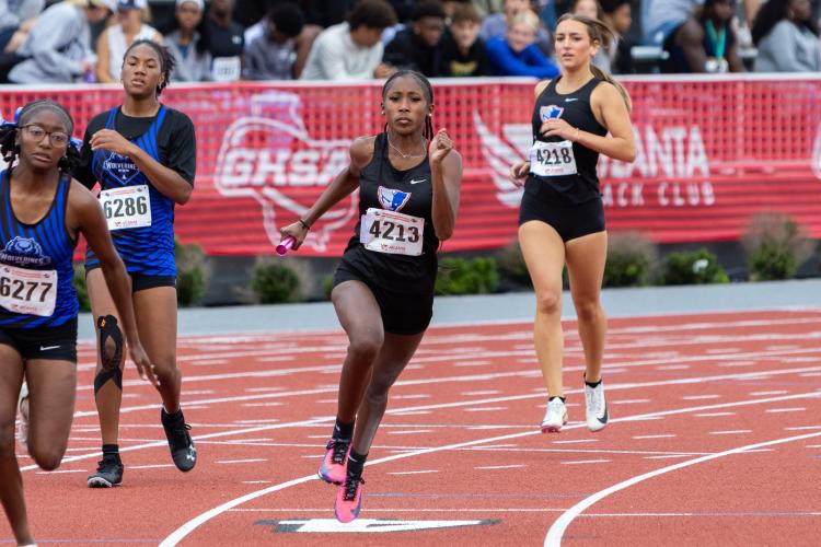 Oglethorpe County sophomore Mirakle Merritt competes in the 4x100m event during the 2026 GHSA State Track &amp; Field Championships at Spec Towns Track in Athens, Georgia, on Tuesday, May 12, 2026. Oglethorpe County's team DNF'd the event. (Ethan Greene/The Oglethorpe Echo)