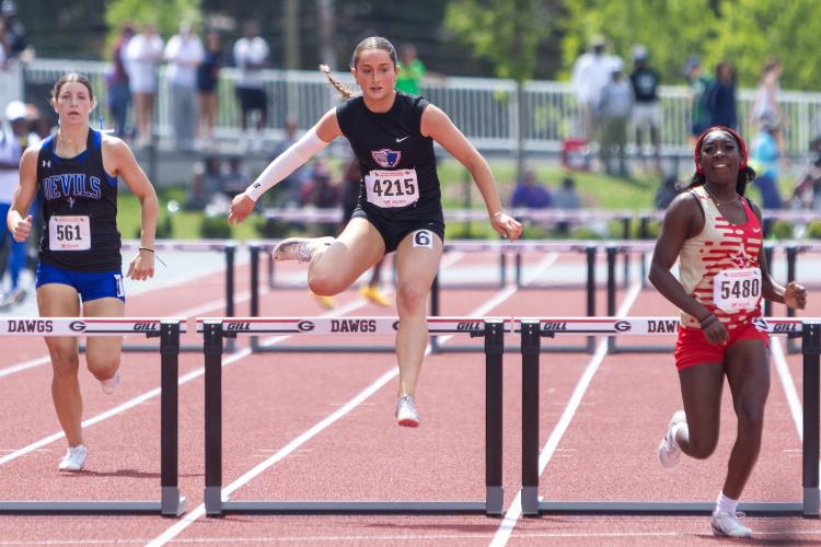 Oglethorpe County’s Elin Turner jumps over a hurdle in the 300-meter hurdles at the Class A Division I meet at UGA on Tuesday. Turner finished fourth in that race and was third in the 100-meter hurdles. (Ethan Greene/The Oglethorpe Echo)