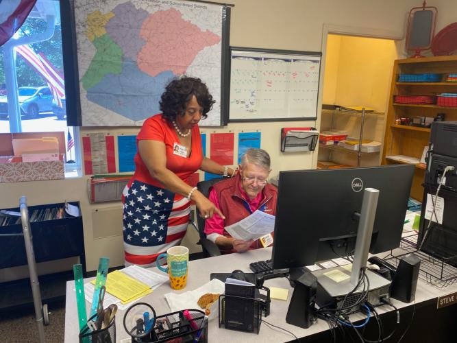 Oglethorpe County elections supervisor Marilyn Huff-Waller and elections assistant Steve McCannon check out the turnout at the elections office on Tuesday. Of the 12,464 registered voters in the county, 3,650 — or 29% — voted in the primary. (Ronnie Boggs/The Oglethorpe Echo)