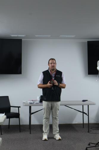 Neal Hunter demonstrates how to set up and use a HemoCue point-of-care hemoglobin device during a prehospital blood administration training course for Oglethorpe County EMS personnel on Tuesday, June 23, 2026, at the Crawford Fire Department. (Ellie English/The Oglethorpe Echo)