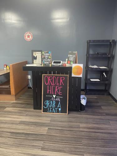 When guests arrive, there’s a station where they can place orders at The Local Spot before taking a seat. The restaurant celebrated its grand opening on Friday. (Lexie Shadix/The Oglethorpe Echo)