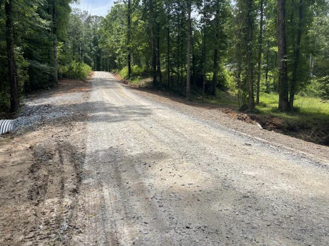 The newly repaired Emerald Green Drive. The Oglethorpe and Madison County works crews were able to get the road reopened on Tuesday, May 26, one day after it washed out. (Lexie Shadix/The Oglethorpe Echo)