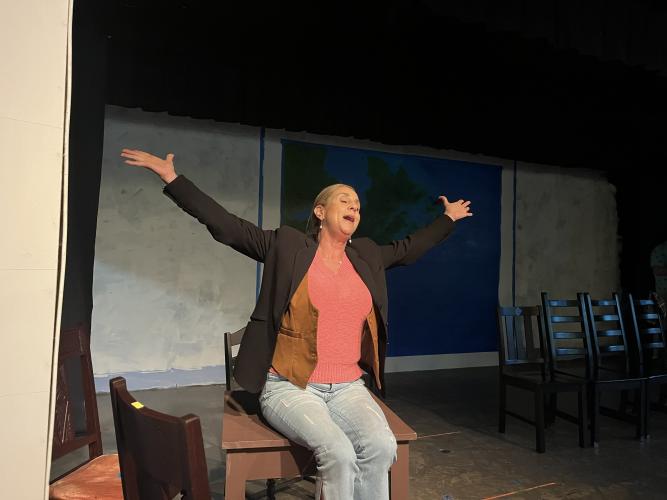 Leslie Whitehead-O’Neal practices her character's solo during rehearsal on June 11 at the Historic Crawford School. O'Neal, who has worked with Arts! Oglethorpe since 2019, plays the roles of both Newfoundlander Annette and airline pilot Beverly Bass in “Come From Away.” (Sarah Nanos/The Oglethorpe Echo)