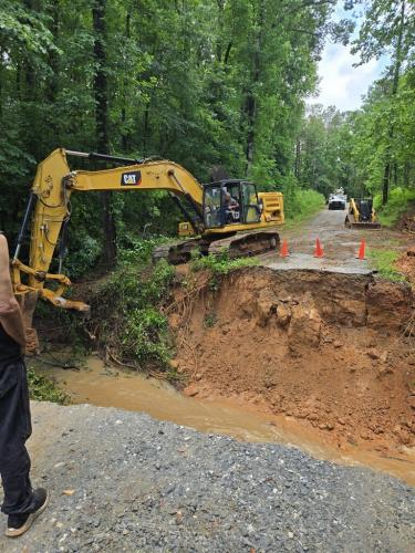 Oglethorpe and Madison County public works crews begin work on Emerald Green Drive on May 26, after heavy rain washed out the road on Memorial Day, leaving 30 residents trapped. The road was restored just one day after the damage. (Submitted Photo)