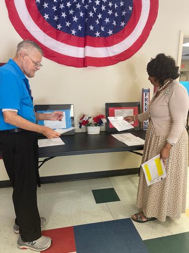 Elections officials Steve McCannon and Marilyn Huff-Waller review sample ballots on Friday for Tuesday's runoff election. While all local races were decided in May, nearly 18% of registered voters in Oglethorpe County turned out to vote in six Republican and four Democratic races for federal and statewide offices on the June 16 ballot. (Lexie Shadix/The Oglethorpe Echo)