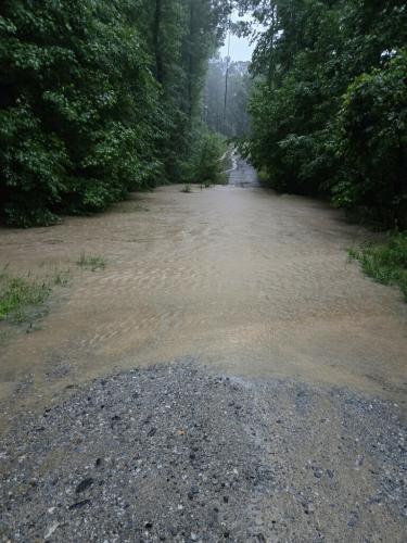 Emerald Green Drive flooded on May 25, leaving 30 residents stranded on one side of the dead-end road.  Chairman Jay Paul of the Board of Commissioners said the repair cost was around $17,000. (Submitted Photo)