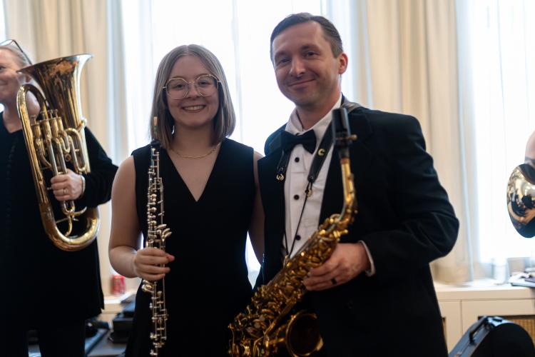 Kassie Mathews, left, and Jesse Mathews, right pose for a photo before the Classic City Band's concert at Carnegie Hall in New York on Sunday, June 28, 2026. (Ethan Greene/The Oglethorpe Echo)