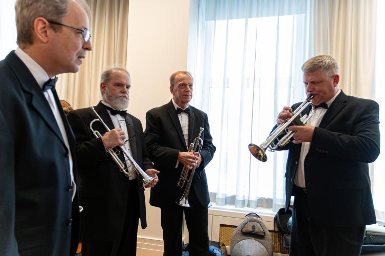 Crawford resident Matt Latocha, right, warms up with the Classic City Band trumpet section before performing at Carnegie Hall in New York on Sunday, June 28, 2026. (Ethan Greene/The Oglethorpe Echo)