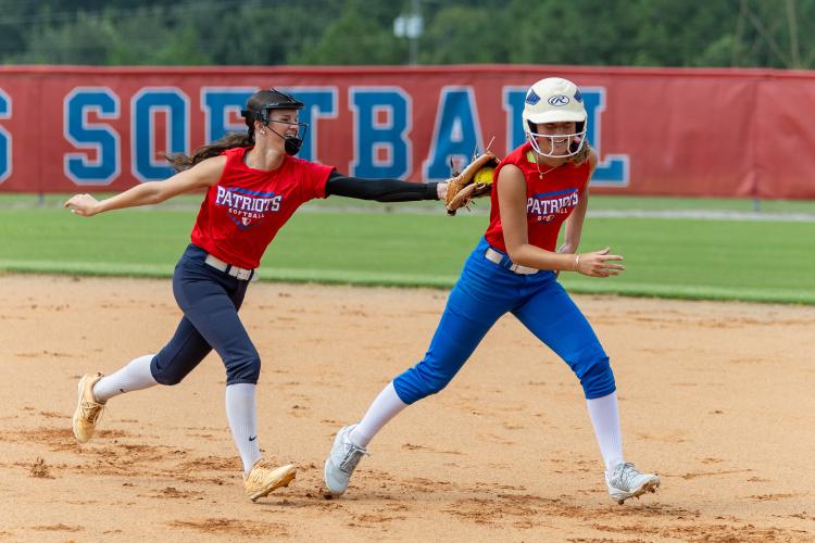 OCHS senior Khloe Eidson tags junior Georgia Turner during practice at Oglethorpe County High School in Lexington, Georgia, on Monday, July 27, 2026. The Patriots season starts at Baldwin on Aug. 1. (Ethan Greene/The Oglethorpe Echo)