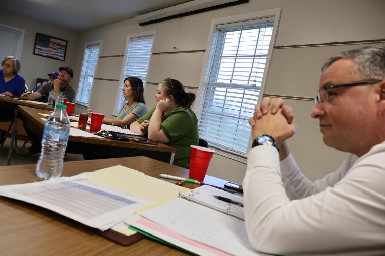 Phillip Powell listens to a discussion about budget plans at a BOE work session in March. He began attending meetings and implementing his plans in the spring, even though Powell didn’t officially start until July 1. (Jasmine Milbourne/The Oglethorpe Echo)