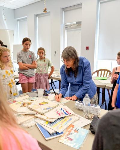 Toni Carlucci gives a watercolor class at The Oglethorpe County Library on June 13. The library worked with the Georgia Museum of Art to pull off the event, which was one of many the library has hosted over the summer as a part of their summer reading program. (Submitted Photo)