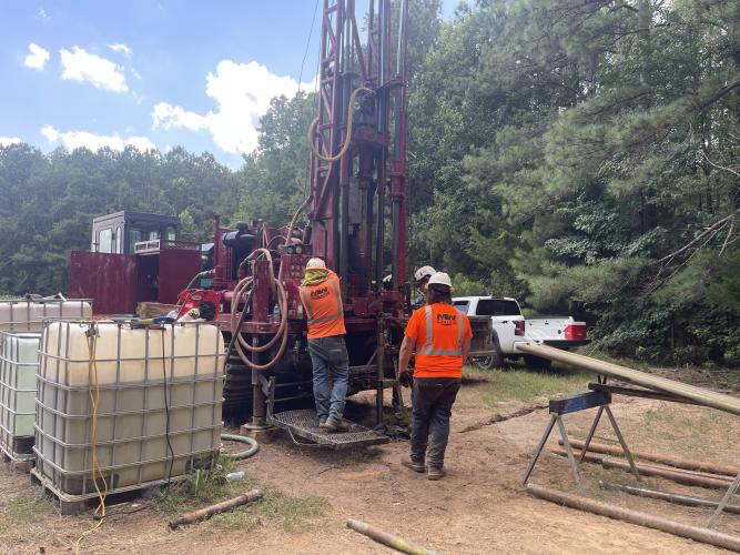 Workers take core samples of the granite on July 7 on part of the 534-acre site that Oglethorpe County is looking to sell. Two granite companies are taking samples, and three others are preparing to do the same. (Lexie Shadix/The Oglethorpe Echo)