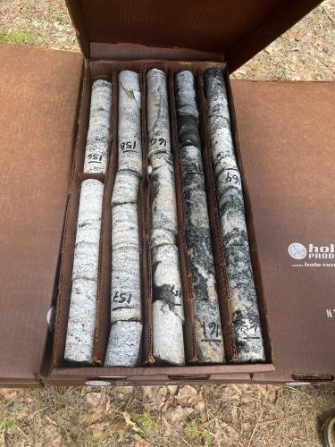 Granite samples taken from a portion of the 534-acre property off Buddy Faust Road are marked and boxed. They will be analyzed by a geologist, allowing companies to determine the value of the land and decide if they will submit a bid. (Lexie Shadix/The Oglethorpe Echo)