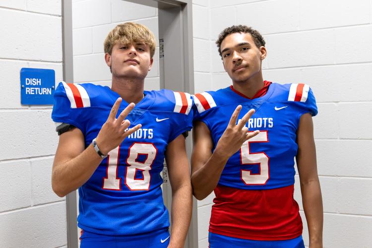 Quarterbacks Justin Wilson (18) and Nathan McCalla (5) competed for the starting job all summer, with McCalla winning the job. He takes over for Caden Hartrum. (Ethan Greene/The Oglethorpe Echo)