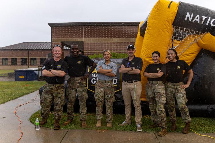 Members of the Army National Guard pose for a portrait during Oglethorpe County Community Day hosted by Family Connection at Oglethorpe County Middle School in Lexington, Georgia, on Saturday, Aug. 8, 2026. (Ethan Greene/The Oglethorpe Echo)