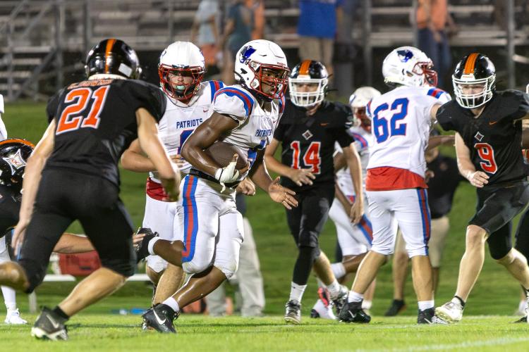Running back Zion Pass (4) finds room to run during Oglethorpe County’s 28-21 victory over Glascock County in a scrimmage on Friday. Pass and seniors Paris Crowder and Jackson Tatum return to power the wing-T offense. (Ethan Greene/The Oglethorpe Echo)