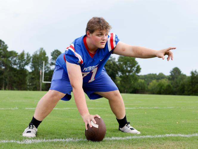 Center Kayden Phelps lines up for photos at OCHS picture day earlier this month. He moved from guard in the offseason to play center for the first time. (Ethan Greene/The Oglethorpe Echo)