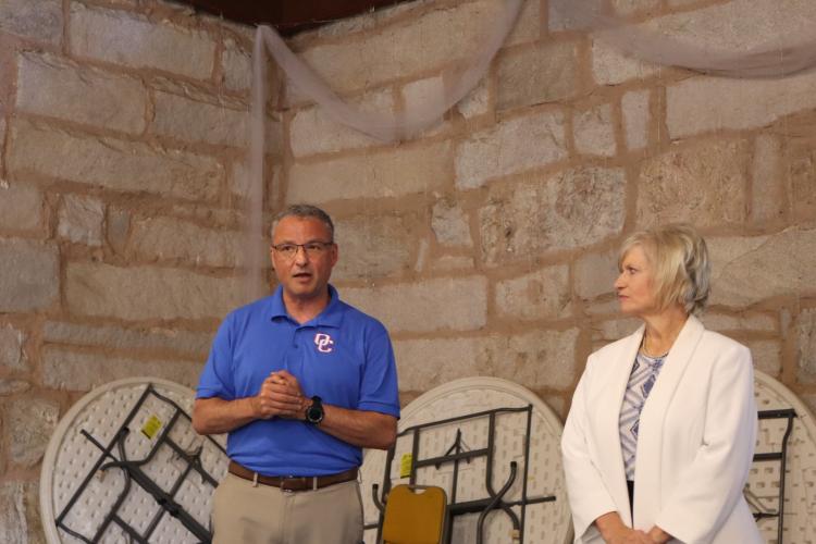 Phillip Powell (left), the superintendent of the Oglethorpe County School System, and Laurie Allison, director of Northeast Georgia RESA work with BOE members during a retreat at the Historic Depot in Crawford on Friday. (Ellie English/The Oglethorpe Echo)