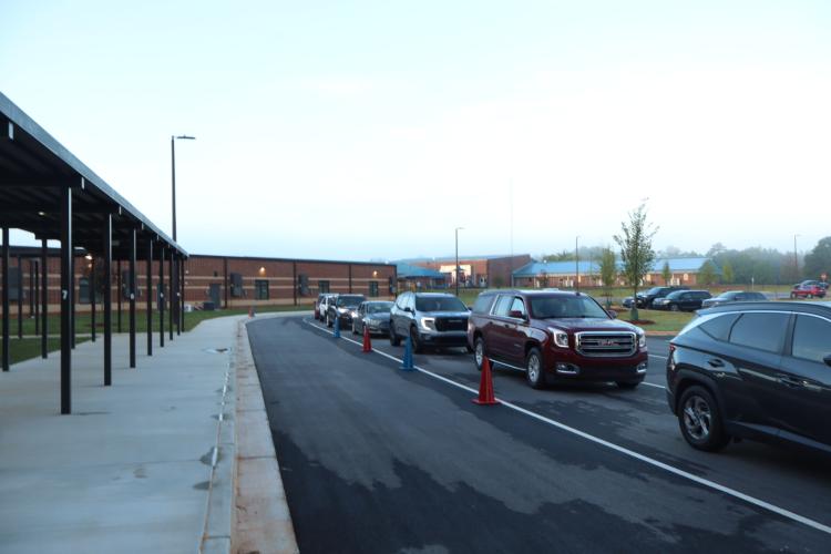 The car rider line forms outside Oglethorpe County Elementary School just minutes before the doors open for the first day of school last Friday. Principal Katie Baldwin said the school had cut time during the drop off and pickup process by Monday. (Ellie English/The Oglethorpe Echo)