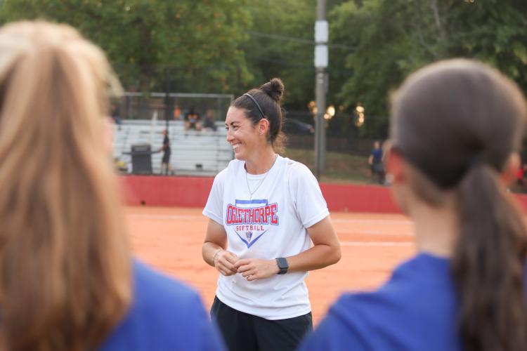 Oglethorpe County High School head coach Brianna Dickens smiles after the Clarke Central High School on Wednesday, Sept. 2, 2026. The Patriots beat Clarke Central 12-1 during its makeup game. (Photo/Sydney Jarrard)
