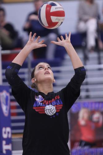 Naomi McPeake sets up a teammate during warmups before Oglethorpe County’s volleyball match against East Jackson last week. McPeake helped lead the Patriots to the Class A state title as a freshman last year. (SYDNEY JARRARD/THE OGLETHORPE ECHO)