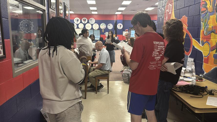 Lee Jones plays the piano as students practice a song in the OCHS music room on Sept. 14, 2026. The chorus consists of 10 students and four vocal parts. (Sabrina Felix/The Oglethorpe Echo)