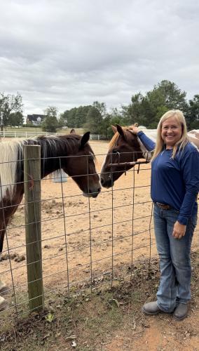 Jenny Liedberg with her horses Apache (left) and Ranger at Agape Farm on Sept. 25 in Colbert. Liedberg has been training youth to ride horses at Agape Farm since 2001. (Matthew Herren/The Oglethorpe Echo)