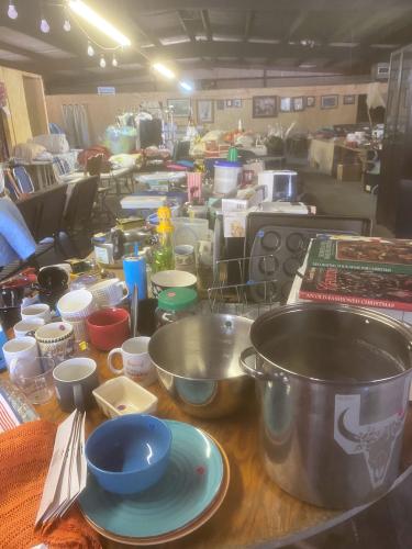 Bedding, linens, seasonal decorations, kitchenware and home decor are among the donated items for sale at the Lexington Community Center. The Downtown Development Authority will use proceeds from the yard sale for heating and air conditioning and other improvements to the building. (Submitted Photo)